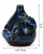 Deep ocean blue sea crab ceramic vase measuring 6.5 inches wide by 7.5 inches tall