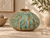 Handcrafted Green Moss textured ceramic vase displayed without flowers in a warm organic interior