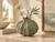 Handcrafted Green Moss ceramic vase displayed in a warm neutral interior