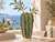 Green Moss ceramic cactus vase with olive branches styled in a Mediterranean coastal interior