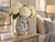 Blue and white coral ceramic vase styled in a refined living room with soft neutral décor