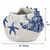 White and cobalt blue sea life ceramic vase measuring 8 inches wide by 6 inches tall