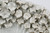 Close-up of hand-sculpted barnacle details on white Thai ceramic bowl