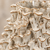 Close-up detail of the handmade Thai white coral ceramic vase showing dimensional coral texture and gold edging