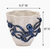 Small blue and white octopus ceramic vase measurement image showing approximately 10 inches wide by 9.5 inches tall.