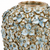Close-up of sculpted floral relief and indigo blue and cream glaze on handmade Thai ceramic vase