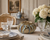 Tidepool Coral ceramic vase displayed on a refined tabletop in an upscale coastal living space