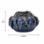 Medium indigo blue ceramic bowl planter styled in an upscale coastal living room
