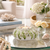 Small Ocean Bloom ceramic vase styled on a coastal table with soft neutral decor and natural accents