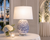 Handmade Thai Blue Jasmine Bloom Ceramic Table Lamp styled in a bright refined bedroom interior.
