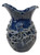 Azure Reef blue octopus ceramic vase with sculpted tentacles and dimensional suction-cup detailing on white background.