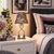 Eve snake skin print shade table lamp on a white nightstand in a teen bedroom with charcoal, white, and mauve decor.