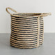 Handcrafted round jute laundry basket in charcoal striped, perfect for storing and transporting laundry, blankets, towels and other household items.