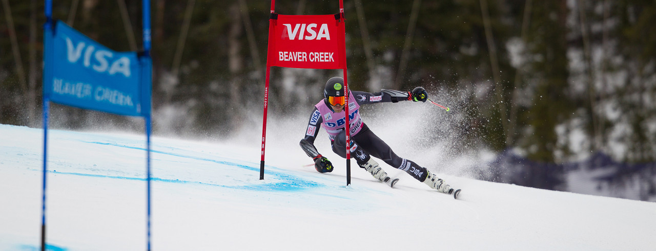 WEND ski race team ambassador Tommy Ford turning at high speed during race run. 