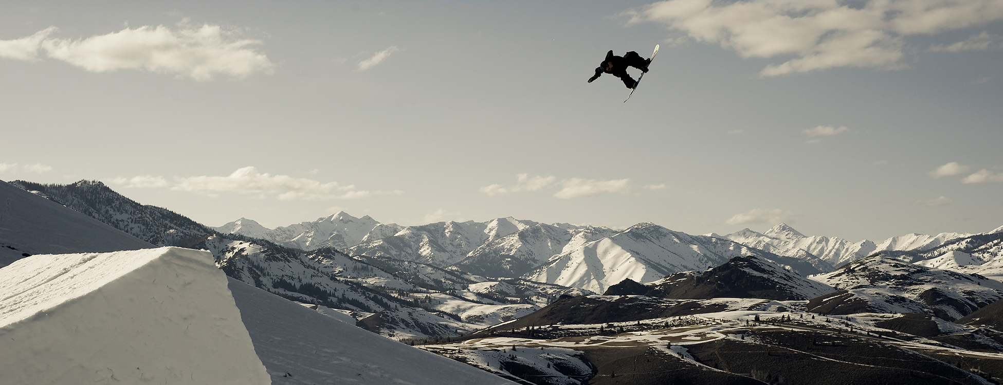 WEND snowboard team Rider Kazu Kokubo flying. 