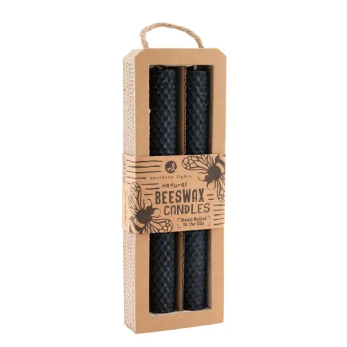 Two hand-rolled black beeswax taper candles featuring a detailed honeycomb texture pattern, ideal for elegant home decor or dining tabletops.