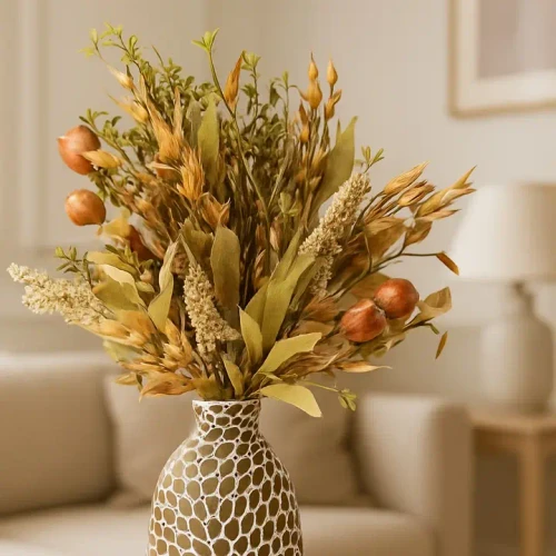 A faux Fall Serenity Pick featuring warm-toned autumn leaves, natural grasses, seed heads, and harvest-inspired accents arranged in a decorative vase.