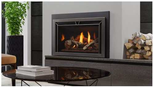 Front view of a Heat & Glo SupremeX Medium 30-inch direct vent natural gas fireplace insert featuring an immersive firebox with realistic hand-painted Birch logs glowing over an LED ember bed.