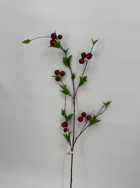 A long, elegant 54-inch decorative holiday spray featuring tall, lifelike green stems adorned with vibrant clusters of rich red winter berries.