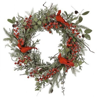 A lush 22-inch holiday front door wreath crafted from mixed evergreen branches, adorned with pinecones, red berry clusters, and two detailed red cardinal figurines.