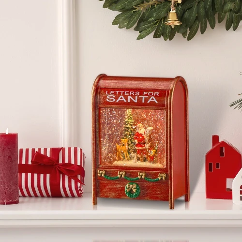 A classic red "Letters for Santa" mailbox designed as a holiday waterglobe, featuring an illuminated interior scene with Santa Claus and festive glitter.