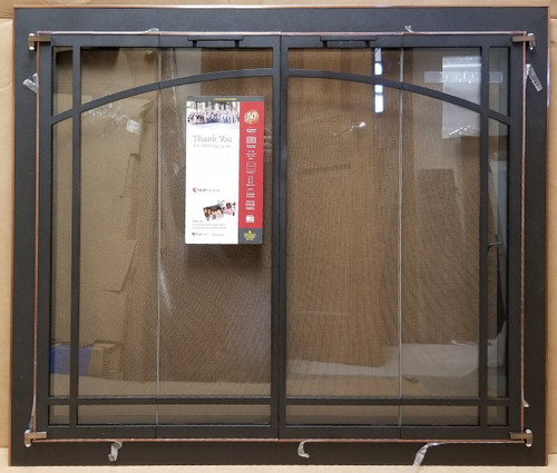 Clearance Custom Glass Fireplace Door (CL123) showcasing a rugged Bifold Bar Iron Rectangle design in a unique Textured Black and Copper finish with an integrated protective single mesh door.