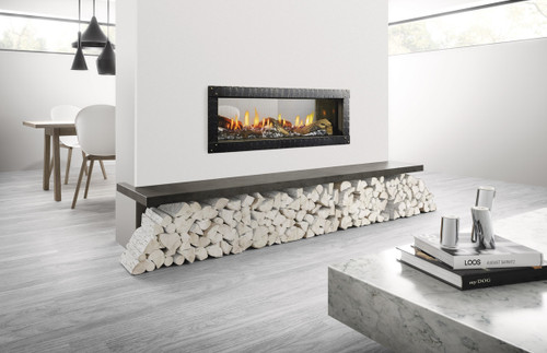 Front view of a Heat & Glo Mezzo 48-inch see-through linear direct vent natural gas fireplace showcasing a modern ribbon flame extending across a glass media bed, visible from two sides.