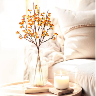 Vibrant artificial autumn bittersweet spray featuring realistic orange and yellow berries clustered along a flexible, rustic brown faux stem.
