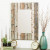Torres 28.5-inch rectangular wall mirror by Aspire Home Accents, featuring a wide frame made of vertical, weathered reclaimed wood planks in varying natural tones.