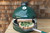 A set of two durable Big Green Egg Pizza Oven Wedges installed on a Large EGG, creating a front-loading opening for quick and easy pizza baking.
