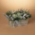 Holiday Pine and Berry Arrangement featuring lush pine sprigs, vibrant red berries, and natural accents in a seasonal tabletop display.
