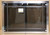 Clearance Custom Glass Fireplace Door (CL113) highlighting a contemporary, matte Brushed Chrome frame with clear glass cabinet-style doors.