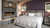 Front view of a Heat & Glo Mezzo 60-inch linear direct vent natural gas fireplace featuring a modern ribbon flame spreading across an expansive glass media bed with reflective black glass interior panels.