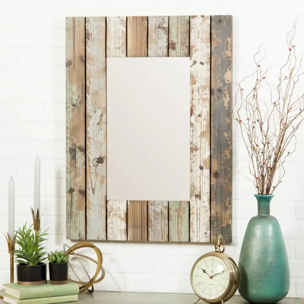 Torres 28.5-inch rectangular wall mirror by Aspire Home Accents, featuring a wide frame made of vertical, weathered reclaimed wood planks in varying natural tones.
