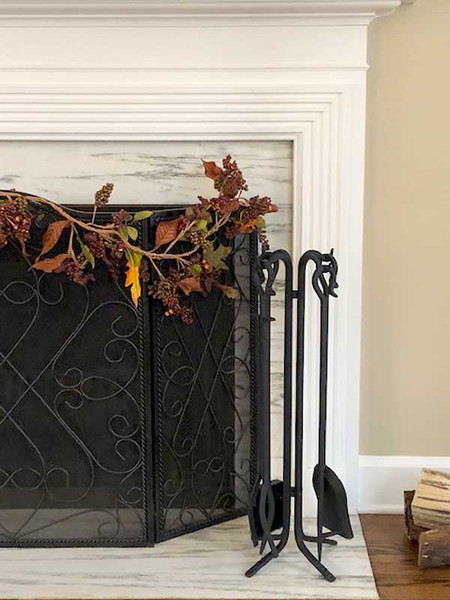 Pilgrim 18002 5-Piece Forged Large Hearth Fireplace Tool Set in Matte Black, featuring a heavy-duty poker, shovel, tongs, natural fiber broom, and central support stand.
