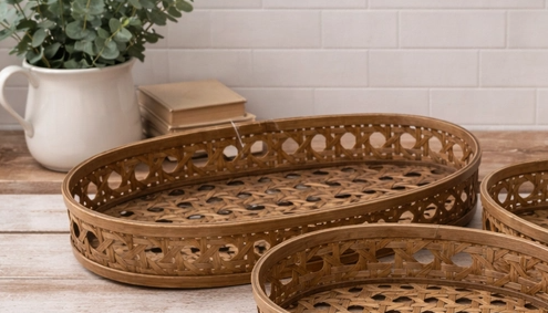 Vintage-Style Rattan Tray displayed on a rustic tabletop, featuring intricate lattice detailing and natural farmhouse styling.