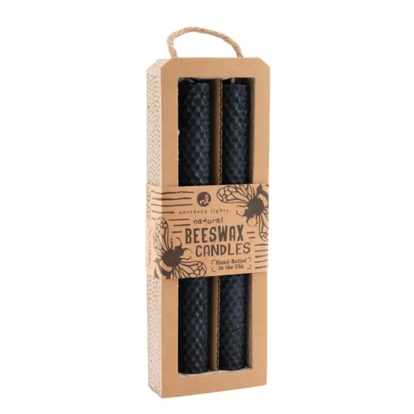 Two hand-rolled black beeswax taper candles featuring a detailed honeycomb texture pattern, ideal for elegant home decor or dining tabletops.