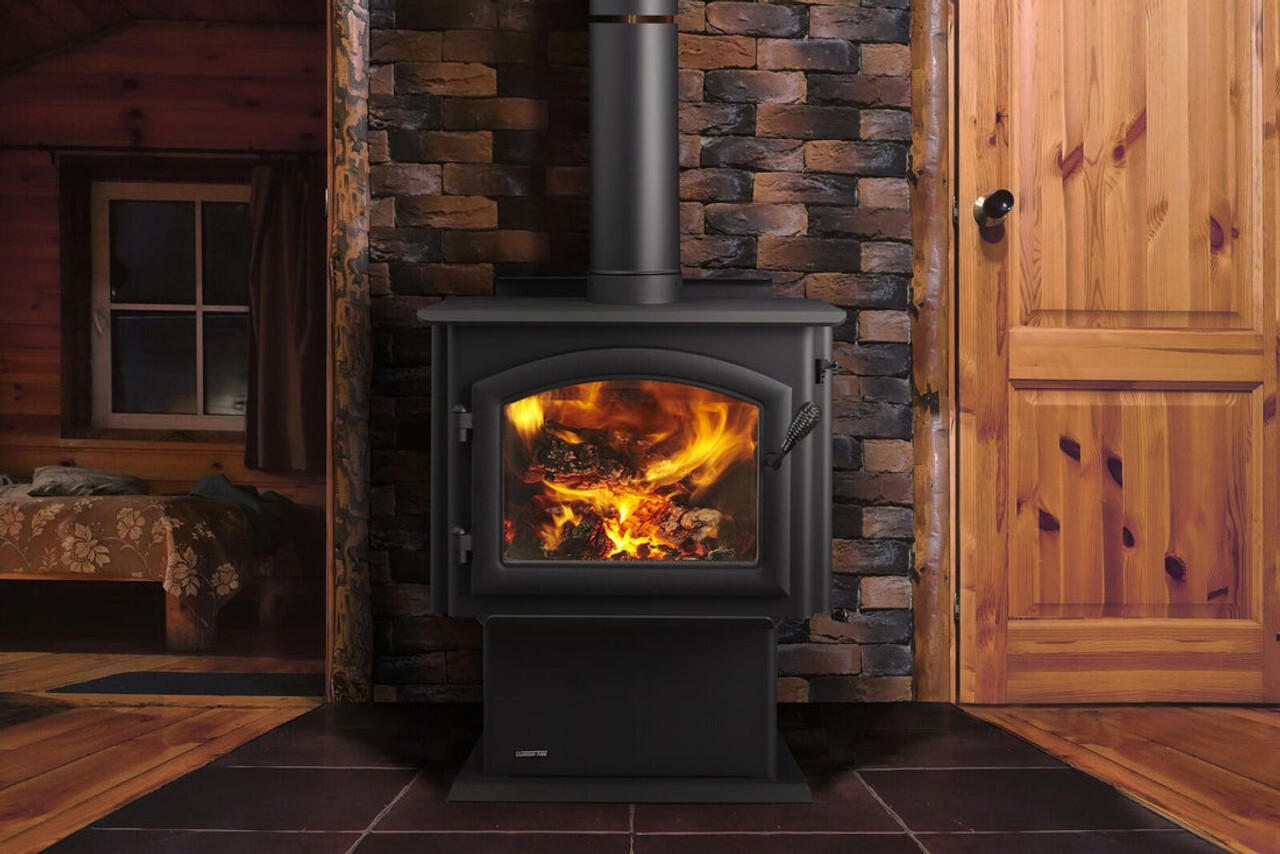 Wood stove burning in a cabin living room