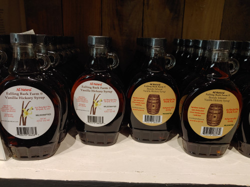 Jars of syrup on a shelf