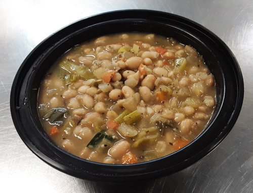 Plastic bowl full of soup