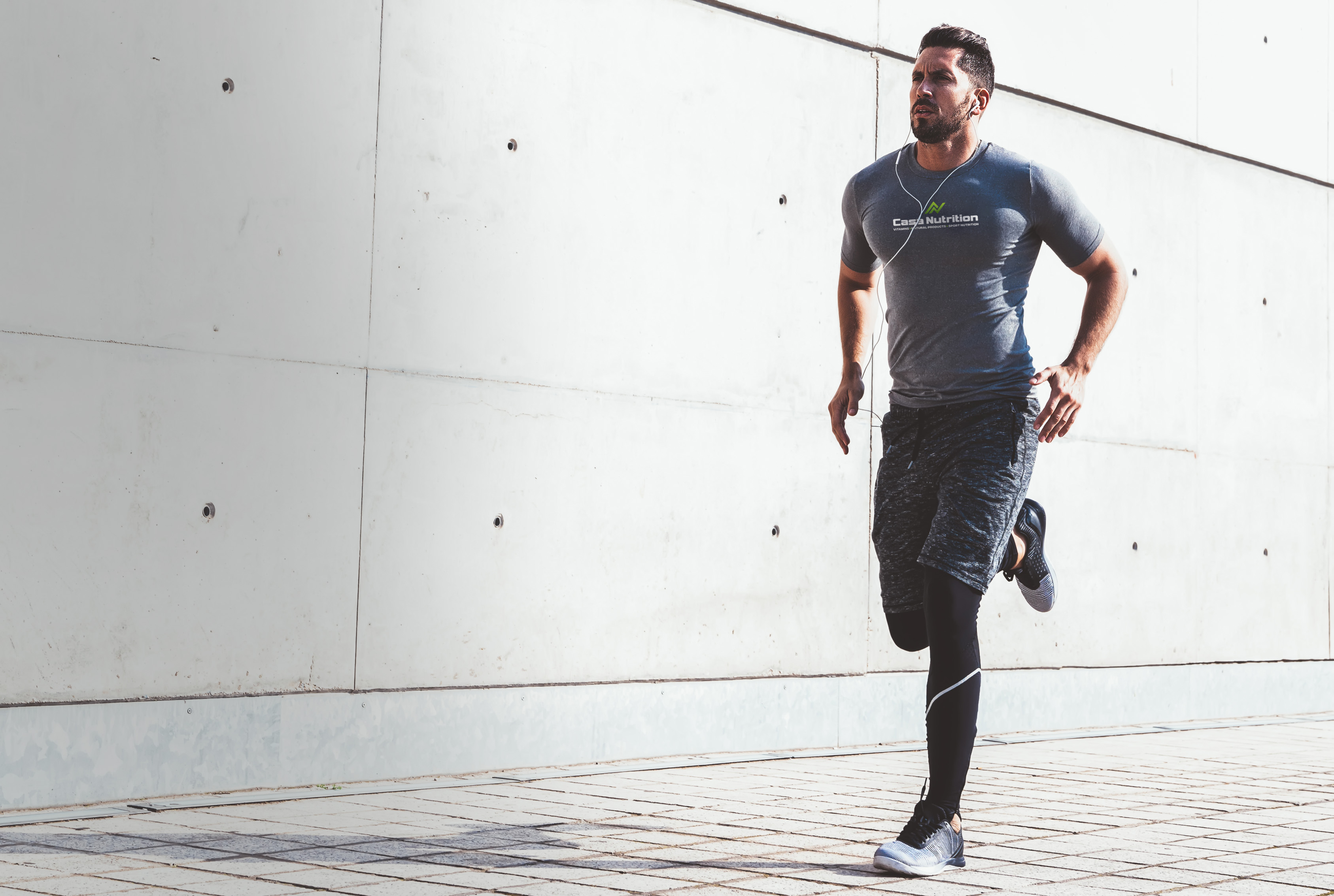 Young athletic man running