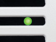 Delta Breez SMT150-200LED — close-up of green status indicator LED on fan grille surface