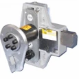 Dormakaba Kaba Simplex 900 Series pushbutton lock — interior back view showing latch mechanism and surface-mounted strike box installed on door