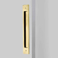 Emtek Modern Rectangular Flush Pull for Door Pull (Opposite Side) in Polished Brass - Lifetime (US3), installed on a door edge — in-use lifestyle shot
