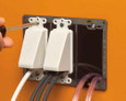 Arlington Industries Reversable non metallic cable entrance hood for existing cables. Single Gang. Color White. Decorator Device Style. Includes two #6 screws.
