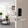 Dormakaba Saffire EVO LZ-D Deadbolt installed on apartment entry door, shown in residential living room setting, Satin Chrome finish