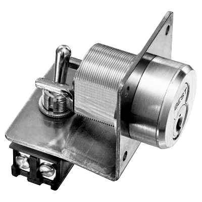 BEST 1W7D2 Electric Key Switch Lock with DPST Toggle Switch and Interchangeable Core - rear three-quarter view showing toggle switch, terminal block, and threaded cylinder body