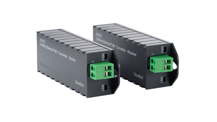 DoorBird A1071 2-Wire Ethernet PoE Converter — Sender and Receiver units shown together, front view with green terminal connectors