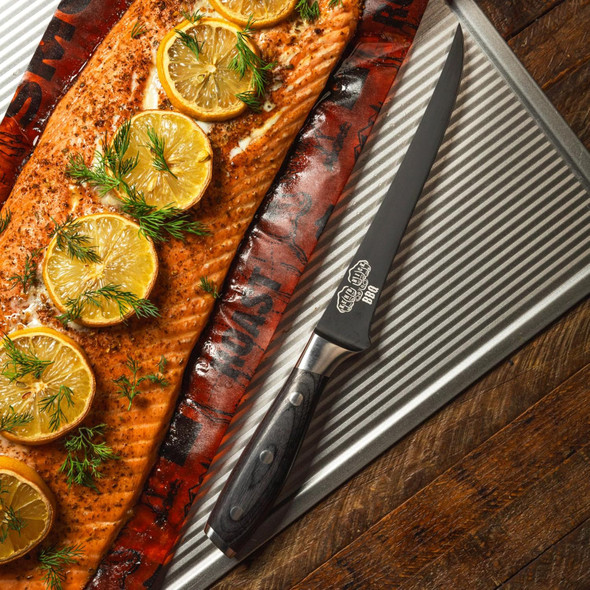Kendrick BBQ fillet knife beside grilled salmon fillets