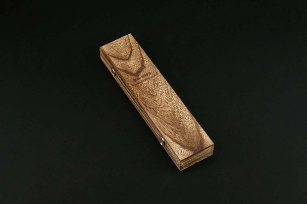 Packed in a nice wooden box.